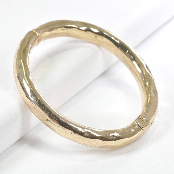 Hammered metal hinge bangle