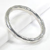 Hammered metal hinge bangle