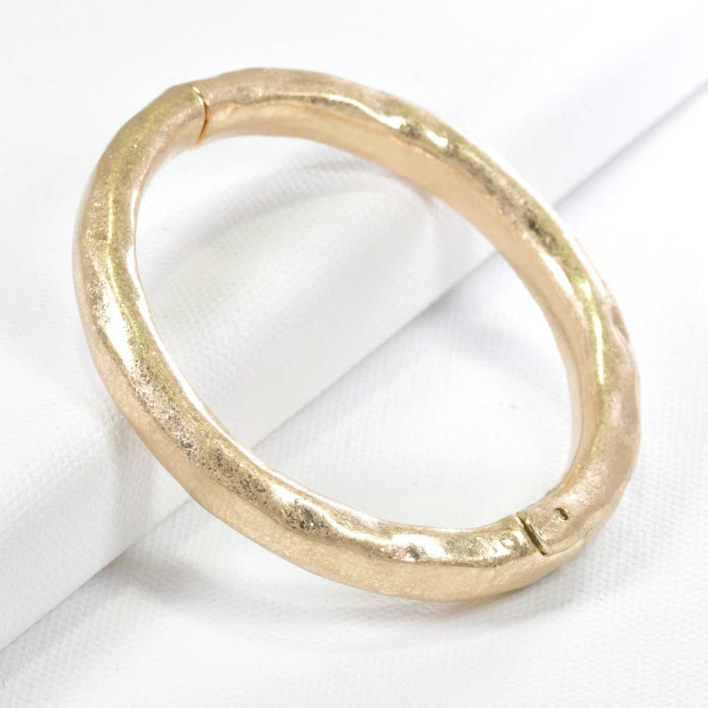 Hammered metal hinge bangle